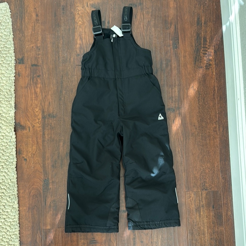 Black Overalls with Adjustable Straps and Waterproof Material